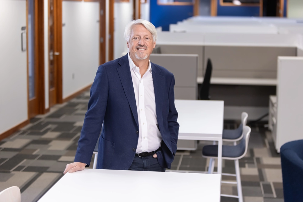 portrait of a smiling person in professional attire